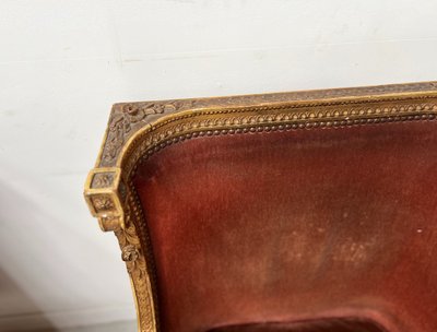 Deux bergères a oreilles de style Louis XVI en bois doré XX siècle