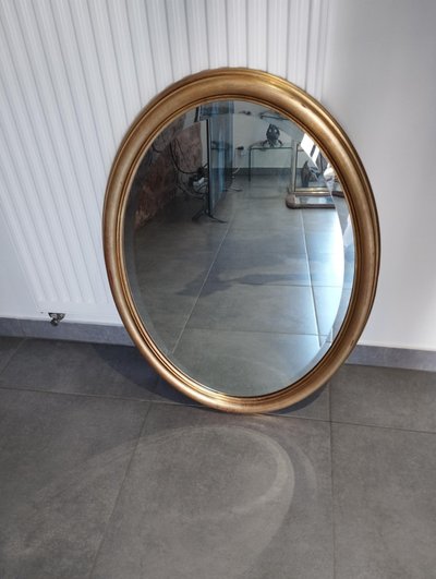 Miroir ovale doré 