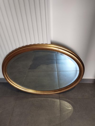 Miroir ovale doré 