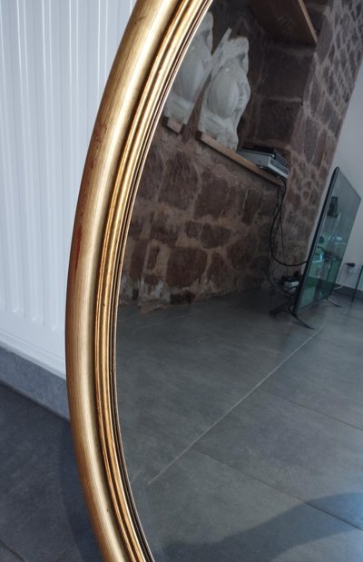 Miroir ovale doré 