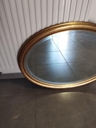 Miroir ovale doré 