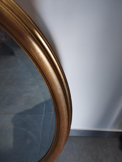Miroir ovale doré 