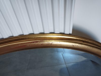 Miroir ovale doré 