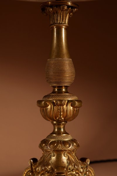 Pair of original table lamps in cast brass.
