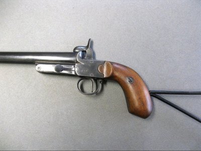 Pistola / Carabina da bracconiere a broche con crosse squelette di St Etienne XIXe.