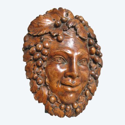 Bacchus head in glazed terracotta.