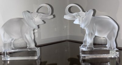 LALIQUE France Pair of Éléphants bookends in moulded and satin-finish crystal.