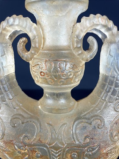 China, Qing Dynasty, early 19th century, candlestick in the form of a small vase surrounded by two rams.