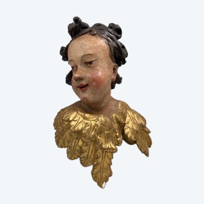 Head of a cherub in carved polychrome and gilded wood, 17th century, entourage of Ignaz Günther