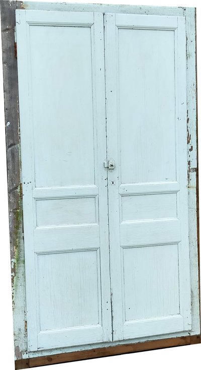 Two antique double cupboard doors with frames