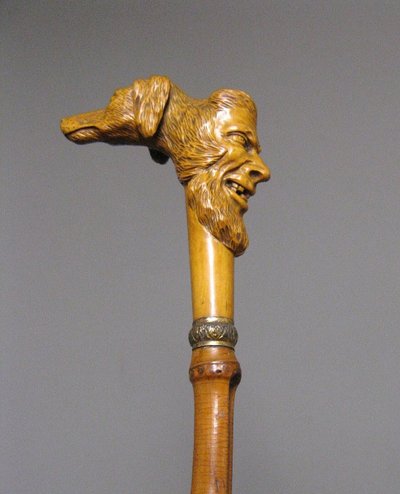Canne d'Art Populaire Pommeau En Buis Sculpté d'Une Tête De Grotesque Et d'Une Tête De Chien. 