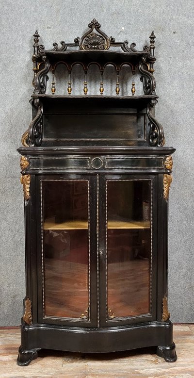 Napoleon III period "Boulle" curved display case in blackened wood and gilded wood circa 1850