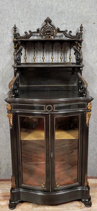 Napoleon III period "Boulle" curved display case in blackened wood and gilded wood circa 1850