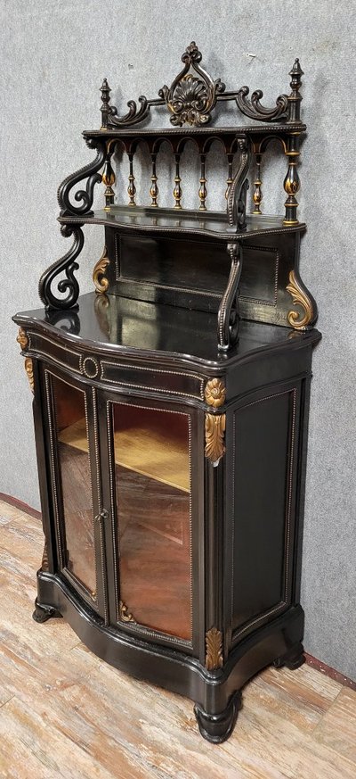 Napoleon III period "Boulle" curved display case in blackened wood and gilded wood circa 1850