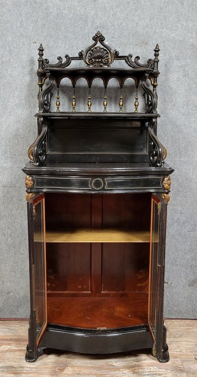 Napoleon III period "Boulle" curved display case in blackened wood and gilded wood circa 1850