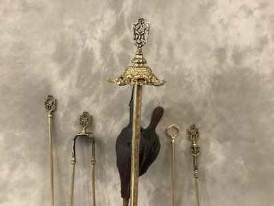 Antico caminetto in bronzo e ottone del XIX secolo