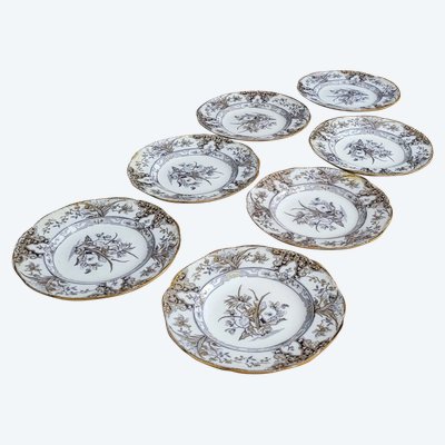 Set of 6 plates plus 1 in early 20th century English porcelain