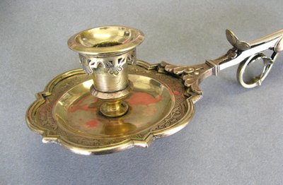 Bronze bishop candlestick with episcopal hand.