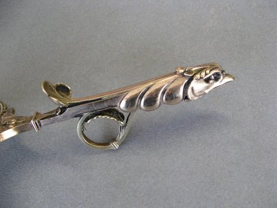 Bronze bishop candlestick with episcopal hand.