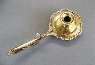 Bronze bishop candlestick with episcopal hand.