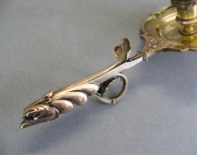 Bronze bishop candlestick with episcopal hand.