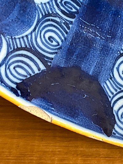 18th century Delft platter "the gilded flowerpot" workshop