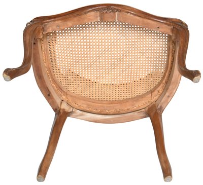 Coppia di poltrone bergère incannucciate in stile Luigi XV