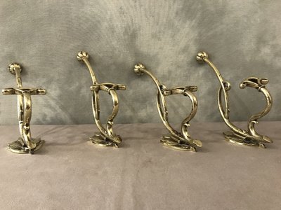 Ensemble de 4 patères, portes manteaux en bronze poli et vernis d'époque début 19 ème 