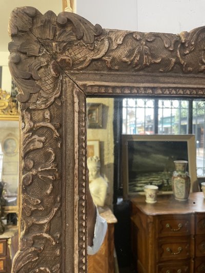 Miroir d’époque Louis XV en bois sculpté 