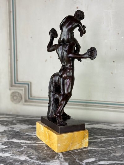 Dionysus on the Shoulders of a Satyr, Bronze after the Antique on a Sienna Yellow Base