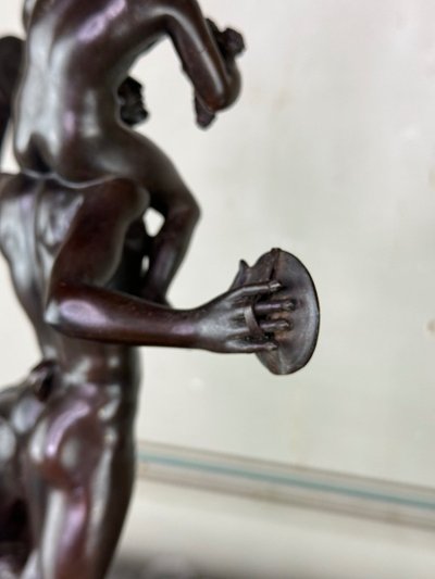 Dionysus on the Shoulders of a Satyr, Bronze after the Antique on a Sienna Yellow Base