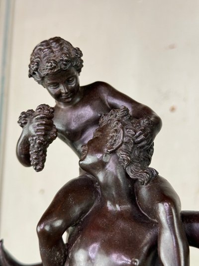 Dionysus on the Shoulders of a Satyr, Bronze after the Antique on a Sienna Yellow Base