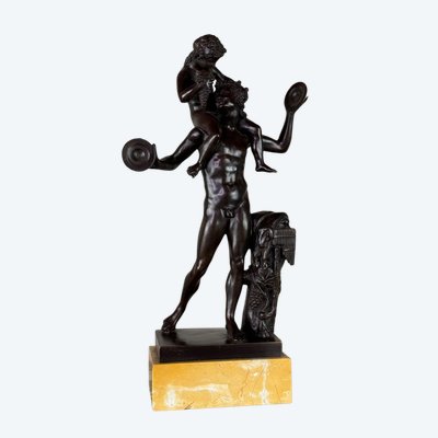 Dionysus on the Shoulders of a Satyr, Bronze after the Antique on a Sienna Yellow Base