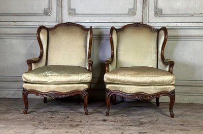 Pair Of Louis XV Style Bergères In Finely Carved Walnut About 1920