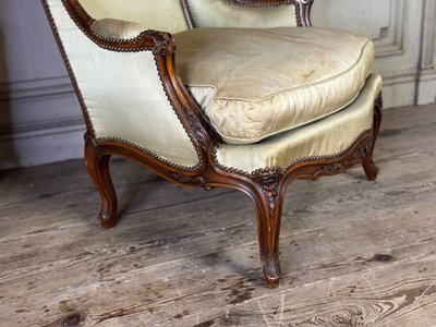 Pair Of Louis XV Style Bergères In Finely Carved Walnut About 1920