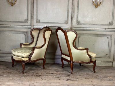 Pair Of Louis XV Style Bergères In Finely Carved Walnut About 1920