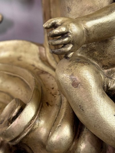 Coppia di chenêts in bronzo dorato e cesellato su modello di Jacques Caffieri, Parigi XIX secolo