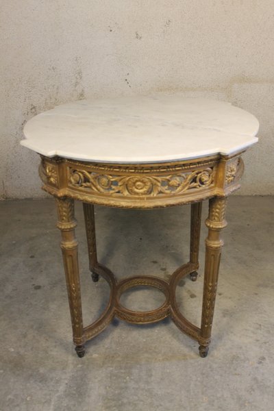 Table guéridon en bois sculpté doré de style Louis XVI époque 19ème