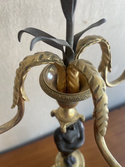 Coppia di candelabri del periodo Direttorio con 2 patine
