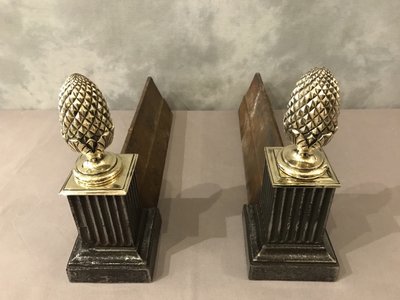 Coppia di alari in ghisa e bronzo del XIX secolo