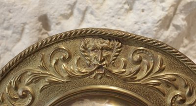 Pair of late 19th century embossed brass witch mirrors
