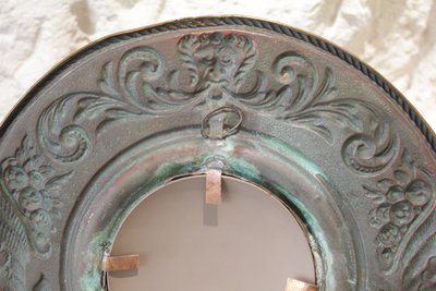 Pair of late 19th century embossed brass witch mirrors