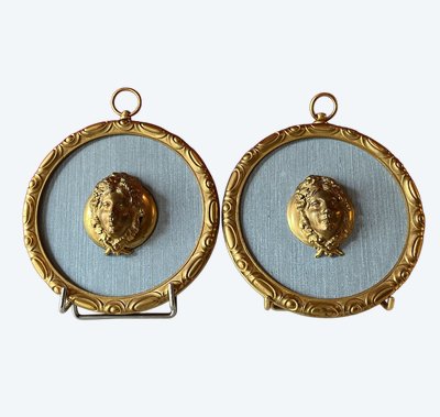 Pair of medallions, Bacchus, gilded bronze