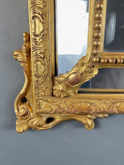 Grand miroir à fronton en bois doré, XIXe siècle