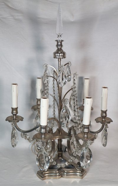 Coppia di candelabri in bronzo argentato, fine XIX secolo