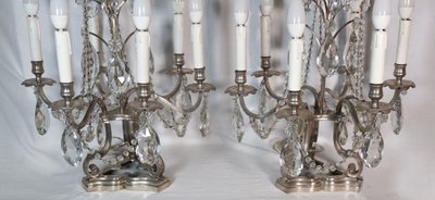 Coppia di candelabri in bronzo argentato, fine XIX secolo