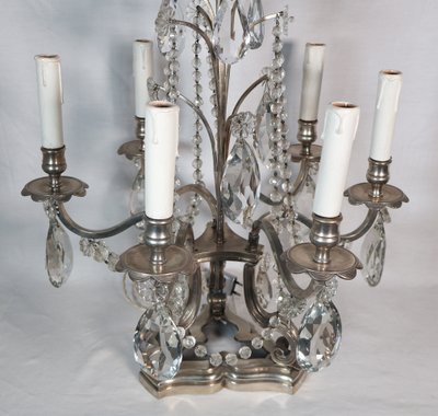 Coppia di candelabri in bronzo argentato, fine XIX secolo