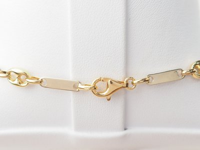 Collana con chicchi di caffè in oro giallo e bianco