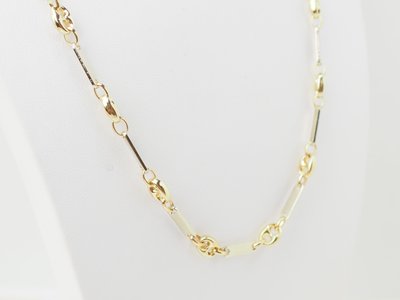 Collana con chicchi di caffè in oro giallo e bianco