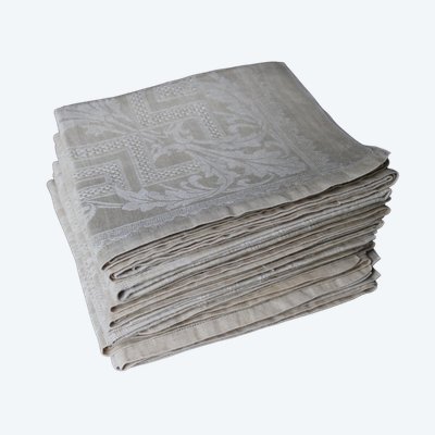 12 ivory-colored linen napkins with openwork floral decoration, very good condition, early 20th century